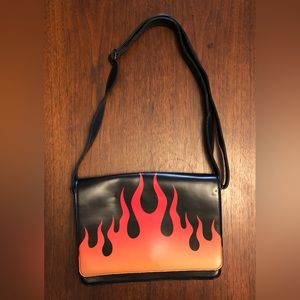 Iron Fist Fire Sign Crossbody Bag Purse Black with Orange Flames